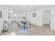 Elegant dining space with a modern table set, flowing into a well-equipped kitchen, perfect for entertaining at 1712 S Main St, Salisbury, NC 28144