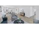 Bright and airy living room with modern decor that flows into an open kitchen with modern appliances at 1712 S Main St, Salisbury, NC 28144