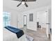 Well-lit main bedroom with bathroom access, large window and contemporary decor at 1712 S Main St, Salisbury, NC 28144
