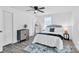 Cozy main bedroom with a ceiling fan, closet, and accent rug at 1712 S Main St, Salisbury, NC 28144
