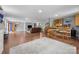 Large basement featuring a bar, hardwood floors, and home entertainment area at 17403 Green Hill Rd, Charlotte, NC 28278