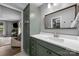 Bathroom featuring modern vanity, ample counter space, and a large mirror at 17403 Green Hill Rd, Charlotte, NC 28278