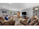 Comfortable living room with hardwood floors and access to the backyard at 17403 Green Hill Rd, Charlotte, NC 28278