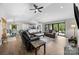 Spacious living room open to the kitchen with hardwood floors and modern finishes throughout at 17403 Green Hill Rd, Charlotte, NC 28278