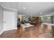 Open living room design with hardwood floors and cozy leather couches at 17403 Green Hill Rd, Charlotte, NC 28278