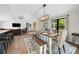 Open-concept space featuring a dining room, living room, and kitchen, creating an inviting atmosphere at 17403 Green Hill Rd, Charlotte, NC 28278