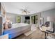 Bright and spacious main bedroom with hardwood floors, recessed lighting, and large windows at 17403 Green Hill Rd, Charlotte, NC 28278