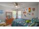 room features a ceiling fan, a large window and hardwood floors at 1800 Oriole Ct, Monroe, NC 28112