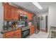 Well-equipped kitchen featuring stainless steel appliances, wooden cabinets, and a modern design at 1800 Oriole Ct, Monroe, NC 28112