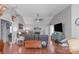 Spacious living room with vaulted ceiling, fireplace, and hardwood floors offers comfortable gathering space at 1800 Oriole Ct, Monroe, NC 28112