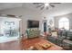 Bright and airy living room with hardwood floors, seamlessly connecting to the dining area at 1800 Oriole Ct, Monroe, NC 28112