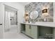 Modern bathroom with decorative wall tiles, vanity, and a shower with a glass door at 1829 Union St, Charlotte, NC 28205
