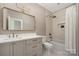 Bathroom featuring a vanity with a framed mirror and a shower over tub at 1829 Union St, Charlotte, NC 28205