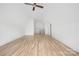 Bright and spacious bonus room features hardwood floors, natural light, and a staircase at 1829 Union St, Charlotte, NC 28205
