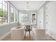 Bright office space with a modern chandelier, soothing paint color and an abundance of natural light at 1829 Union St, Charlotte, NC 28205