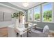 Bright office space with a modern desk, soothing paint color and an abundance of natural light at 1829 Union St, Charlotte, NC 28205