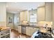 Bright kitchen featuring stainless steel appliances, black granite countertops, and modern finishes at 2015 Club Rd, Charlotte, NC 28205