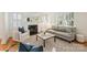 Inviting living room featuring a fireplace, modern decor, and hardwood floors at 2015 Club Rd, Charlotte, NC 28205