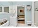 Bathroom with modern sink, a view of the bedroom, and a shower with white subway tile at 2125 Southend Dr # 339, Charlotte, NC 28203