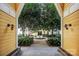 Charming courtyard view showcasing beautiful trees, manicured gardens, and community gathering spaces at 2125 Southend Dr # 339, Charlotte, NC 28203