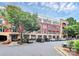 Beautiful building exterior with a mix of red brick, tan accents, professional landscaping, and convenient parking at 2125 Southend Dr # 339, Charlotte, NC 28203