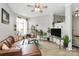 Inviting living room offers hardwood floors, natural light, open layout, and modern design at 2125 Southend Dr # 339, Charlotte, NC 28203