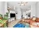Open living room with hardwood floors, high ceilings, modern furniture, and lots of natural light at 2125 Southend Dr # 339, Charlotte, NC 28203
