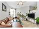 Inviting living room featuring a comfortable brown leather sectional and an abundance of natural light at 2125 Southend Dr # 339, Charlotte, NC 28203