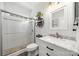 Modern bathroom featuring a glass-enclosed shower and a stylish vanity at 221 Silvercliff Dr, Mount Holly, NC 28120