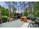Inviting deck area with a gazebo, outdoor seating, and lush surroundings at 221 Silvercliff Dr, Mount Holly, NC 28120