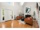 Inviting foyer with soaring ceiling, hardwood floors, and a seamless transition to the staircase at 221 Silvercliff Dr, Mount Holly, NC 28120