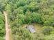 Aerial view of home showing the roof and surrounding trees at 231 Stockwood Dr, Stanley, NC 28164