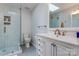 Bright bathroom featuring a glass shower, white vanity, and contemporary fixtures at 231 Stockwood Dr, Stanley, NC 28164