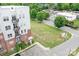 Apartment complex and green space showcase a modern urban living environment at 2338 Yadkin Ave # 101, Charlotte, NC 28205