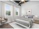 Inviting bedroom with neutral decor, large windows, and comfortable furnishings at 2338 Yadkin Ave # 101, Charlotte, NC 28205