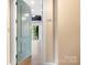 Charming foyer with a light blue door, unit 101, and bright natural light illuminating the hallway at 2338 Yadkin Ave # 101, Charlotte, NC 28205