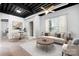 Comfortable living room with a cozy couch, round table, and bright window at 2338 Yadkin Ave # 101, Charlotte, NC 28205