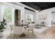 Living room with dining space, sofa, coffee table, and balcony access at 2338 Yadkin Ave # 101, Charlotte, NC 28205