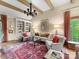 Inviting living room with a classic rug, built-in bookcase, and traditional style furnishings at 2501 Richardson Dr, Charlotte, NC 28211