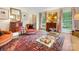Cozy living room featuring classic décor, natural light, and a decorative rug at 2501 Richardson Dr, Charlotte, NC 28211