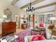 Comfortable living room with built-in shelving, a traditional rug, and plenty of natural light at 2501 Richardson Dr, Charlotte, NC 28211