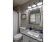 Clean bathroom with a granite vanity, white cabinets, and neutral wall color at 2551 Glenwood St, Kannapolis, NC 28083