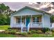 Charming one story home with a welcoming front porch and well-manicured landscaping at 2551 Glenwood St, Kannapolis, NC 28083