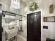 Functional laundry space with utility sink, rod for hanging clothes, and decorative accents at 2600 Kirkholm Dr, Matthews, NC 28105