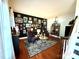 Inviting living room with hardwood floors, ample seating, and a gallery wall of framed art at 2600 Kirkholm Dr, Matthews, NC 28105