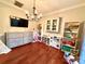 Bright playroom with hardwood floors, a TV, and ample storage for toys, perfect for activities at 2600 Kirkholm Dr, Matthews, NC 28105