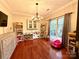 Spacious playroom with hardwood floors, built-in shelving, and a variety of toys for creative play at 2600 Kirkholm Dr, Matthews, NC 28105