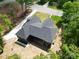 An aerial view of the house showcasing its roof and how it fits into the land at 2694 Woodcrest Sw Dr, Concord, NC 28027