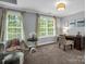 Bright bedroom with large windows and cozy decor with an area that can be used as a study at 270 Conifer Way, Shelby, NC 28150