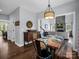 Dining area showcases modern light fixture, table setting, and open layout at 270 Conifer Way, Shelby, NC 28150